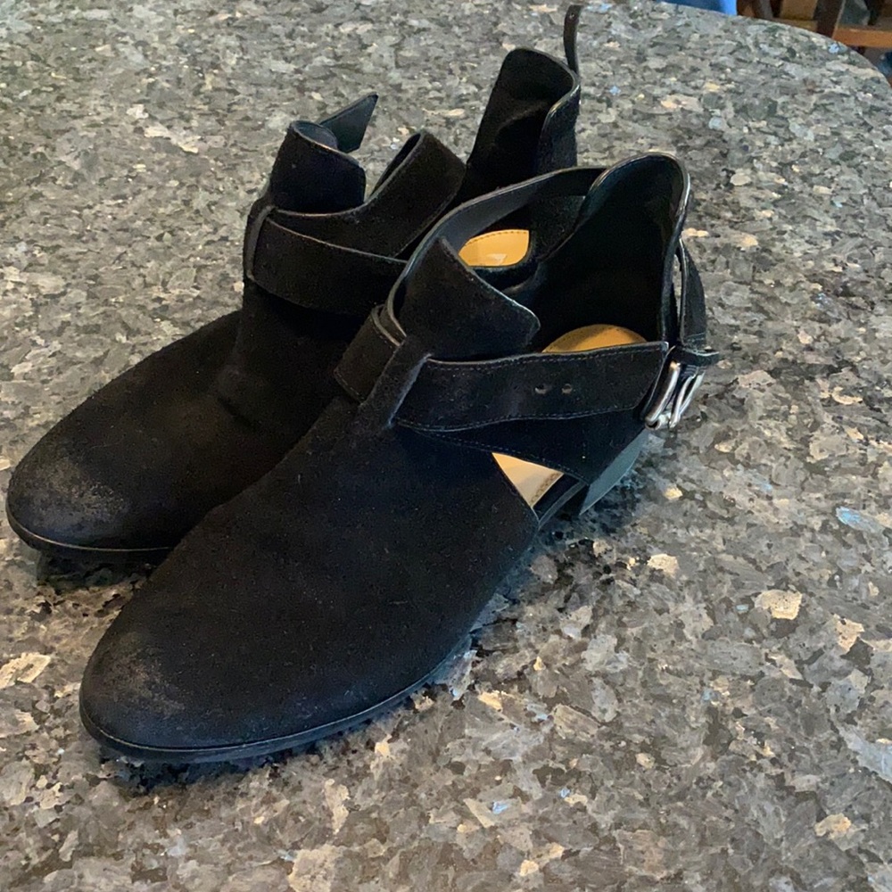 Michael Kors black boots with buckle.